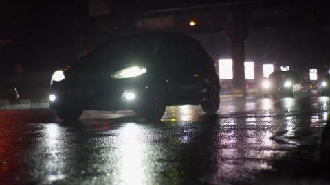 Java, Indonesia - 05/02/2024: Slow motion, cars driving in Wet rainy Vídeos de archivo 274473333