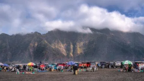 Java, Indonesia, 2 Oct 2024 A lively Mount Bromo scene features colorful umbr Foto stock