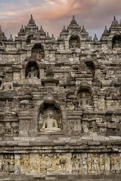 Java, Indonesia, June 13, 2022 - Borobudur Temple shown with multiple sitting Stock Photos