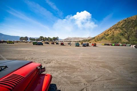 Java Indonesia on September 11,2024 : Tourists 4x4 red Jeep for tourist ren.. Stock-Fotos