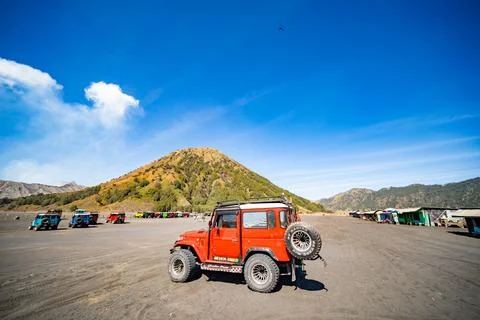 Java Indonesia on September 11,2024 : Tourists 4x4 red Jeep for tourist ren.. Stock Photos