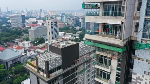 Java, Jakarta, Indonesia, May 20, 2022. Workers are using gondola as vertical Fotos Stock