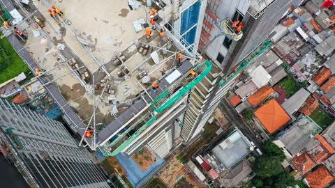 Java, Jakarta, Indonesia, May 20, 2022. Aerial bird down view to workers are Fotos Stock