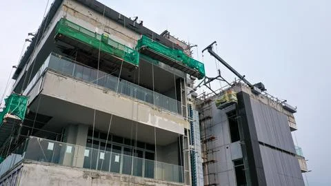 Java, Jakarta, Indonesia, May 20, 2022. Workers are using gondola as vertical Fotos Stock