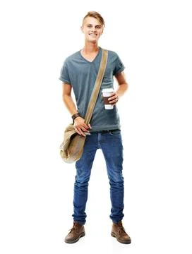 The java keeps me going. A full length studio shot of a young man carying a Fotos Stock