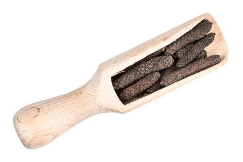 Java long pepper catkins in wood scoop cutout Photos