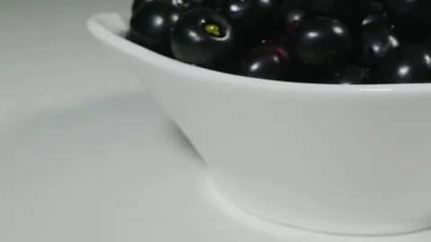 Java plum Fruits or Indian blackberry Fruits in a Bowl 4k Video stock 252206805