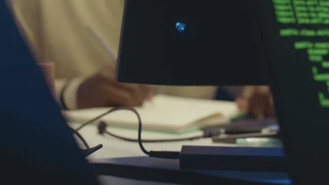 Java Script Code Running on Laptop in Dark Office Stock Footage 259159378