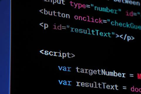 Java script source code on the screen. Stock Photos
