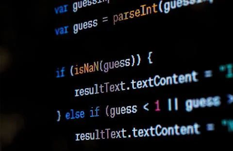 Java script source code on the screen. Stock Photos