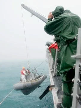Java Sea (Jan. 4, 2015) The recovery team from the Arleigh Burke-class des... Stock Photos