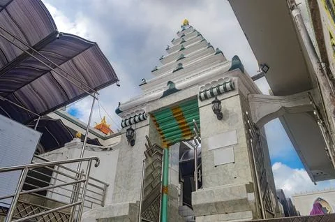A Javanese architectural style mosque gate made of marble in the Sunan Giri.. Stock Photos