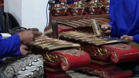 Javanese Young Man Playing Classic Bronze Gamelan. Stock Footage 192205959