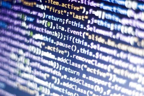 Javascript code. Abstract screen of web developer with glowing code. 스톡 사진