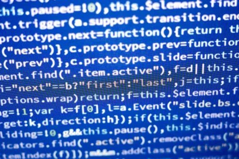 Javascript code. Abstract screen of web developer with glowing code. Foto stock