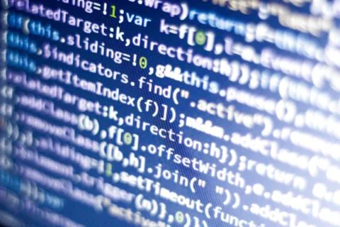 Javascript code. Abstract screen of web developer with glowing code. Stock Photos