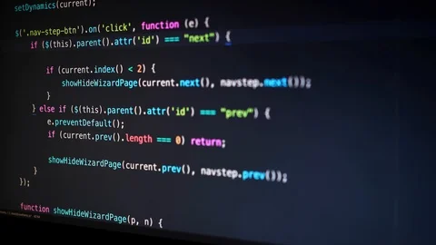Javascript coding in dark. Captured from an angle. Stock Footage 98386264