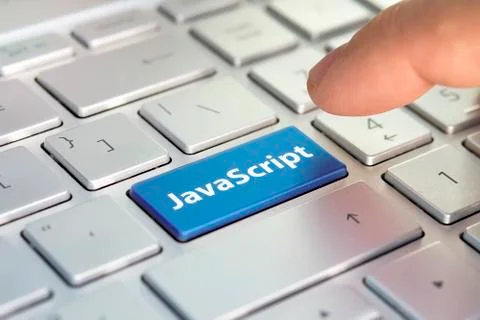 Javascript computer language. writing on button modern of gray laptop. Finger Stockfoto's