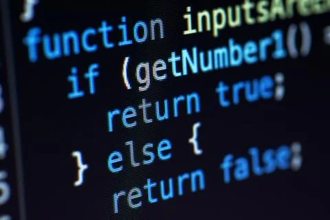 Javascript lines of code into a library for website application. Script lan.. Stockfoto's