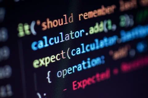 Javascript lines of code into a library for website application. Script langu Stock Photos