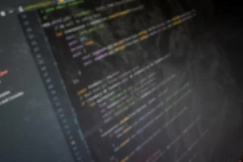 Javascript nodejs Hello World code on screen blurry background image 库存照片