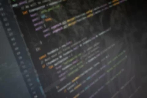 Javascript NodeJs Hello World code on screen blurry background image Stock Photos