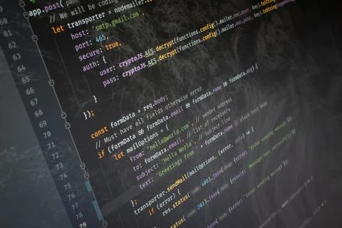 Javascript nodejs Hello World code on screen background image Stock Photos