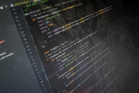 Javascript nodejs Hello World code on screen background image Stock Photos