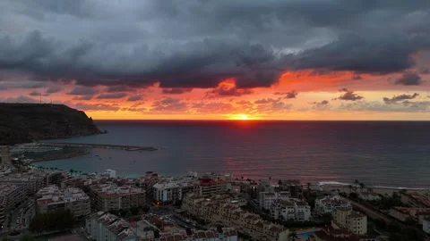 Javea sunset with Mediterranean town, harbor and dramatic golden seascape Vidéo 337140663