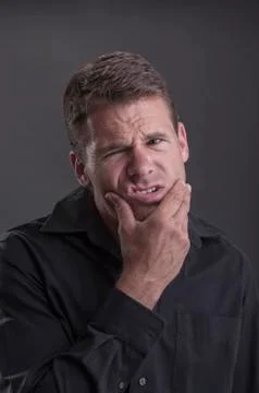 Jaw ache Stock Photos
