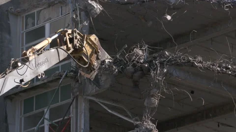Jaws breakup concrete on a building being demolished Stock Footage 54667604