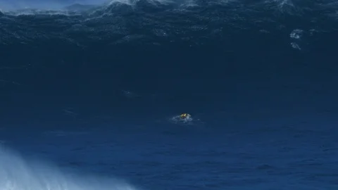 Jaws Surfing huge waves Stock Footage 100998566