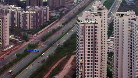 Jayabheri The Peak Condominium complex with outer ring road, traffic flow Stock Footage 341580585