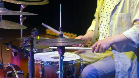 Jazz drummer begins to rhythmically play drums Stock Footage 161814641