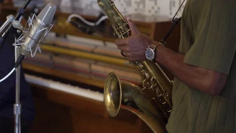 Jazz Solo Performance, Acoustic Improvisation Featuring Saxophone And Piano In Stock-Footage 323771746