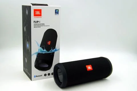 JBL Flip 4 and a retail box Stock Photos