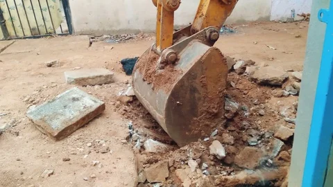 Jcb Bulldozer Digging And Picking Soil From The Ground In The Street 4K Video stock 122205285