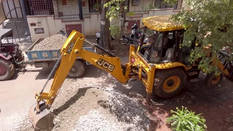 JCB heavy machinery in action loading earth in India. Stock Footage 247421275
