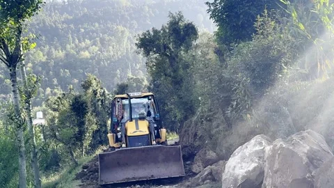 JCB Machine Working on Road for Construction Stock-Footage 346592087