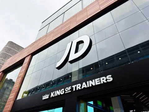 JD King of Trainers storefront with large logo on glass facade in Liverpool.. Stock Photos
