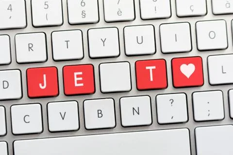 JE T AIME writing on white keyboard with a heart sketch Stock Photos