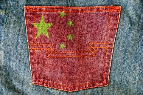 Jeans back pocket on pattern flag Stock Photos