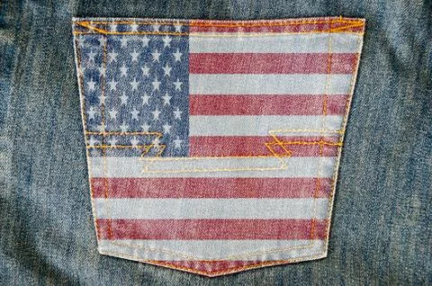 Jeans back pocket on pattern flag Foto stock