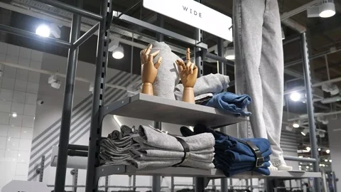 Jeans on a display window or display stand of a clothing store. Stock Footage 282913923