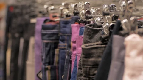 Jeans on a hanger Stockbeeldmateriaal 103688747