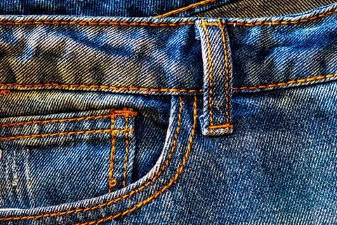 Jeans side with pockets. Old blue denim fabric background texture. Jeans s... Stock-Fotos