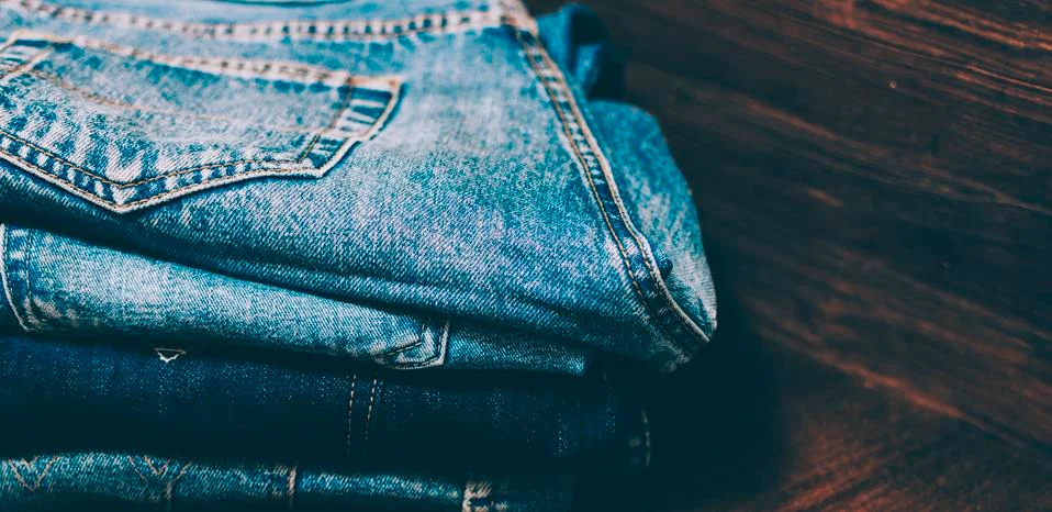 Jeans On Table Stock Photos