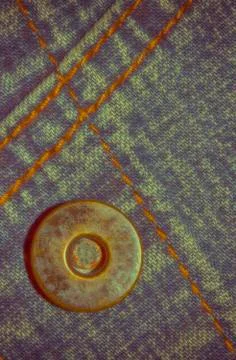 Jeans texture background and button and seam for text area Stock Photos