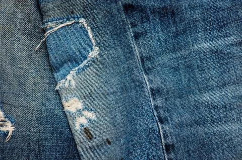 Jeans Texture - detail patch on knee Stock Photos