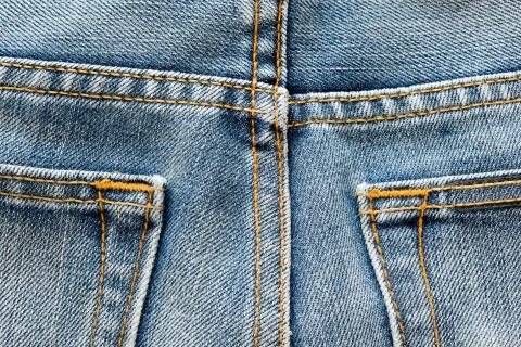 Jeans texture with seam Stock Photos